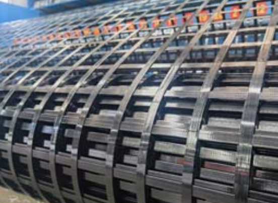 彝良钢塑土工格栅：基建“隐形脊梁”的绿色智造与长寿命进化论